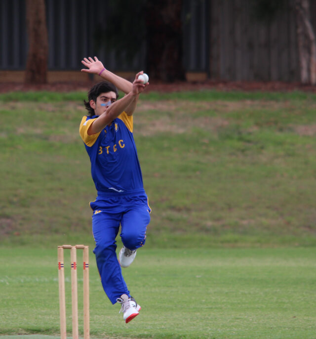 young man bowling in cricket